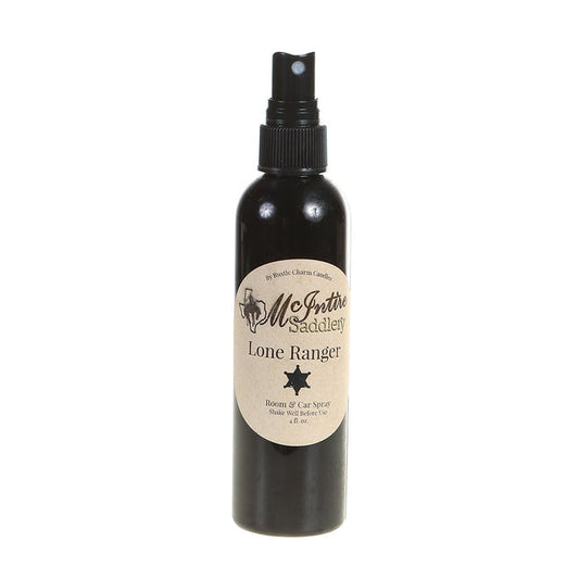 Spray bottle of McIntire Saddlery brand Lone Ranger room spray on a white background