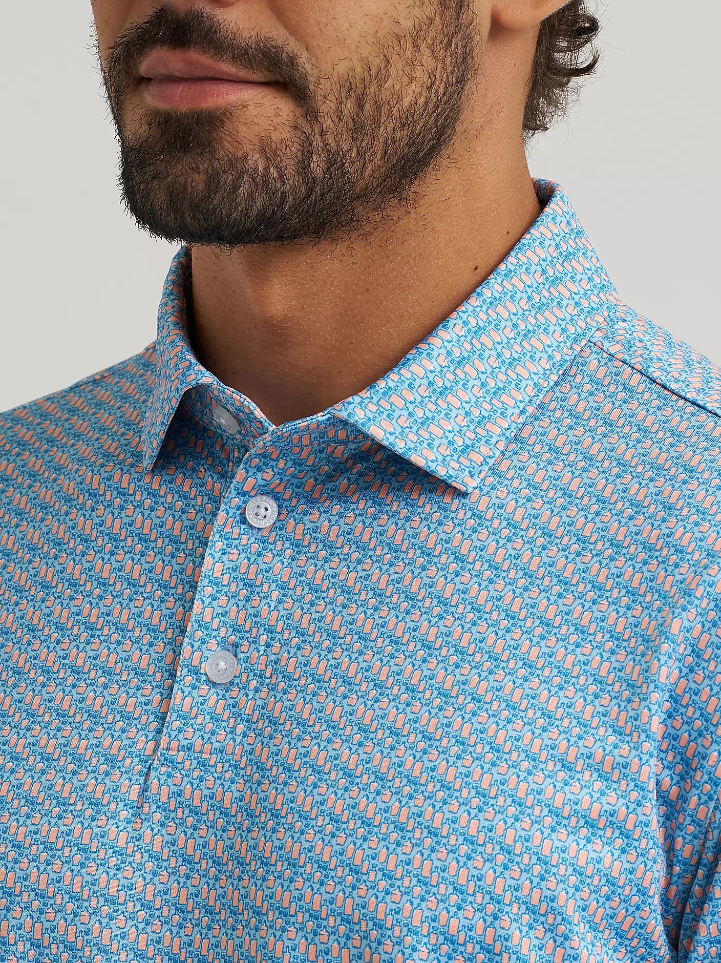 Wrangler All Terrain Gear Men's Performance Polo Shirt in Papaya Punch