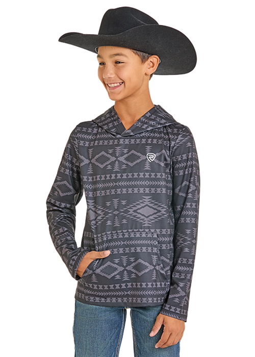 Boy wearing a black Aztec patterned hoodie and cowboy hat on a white background