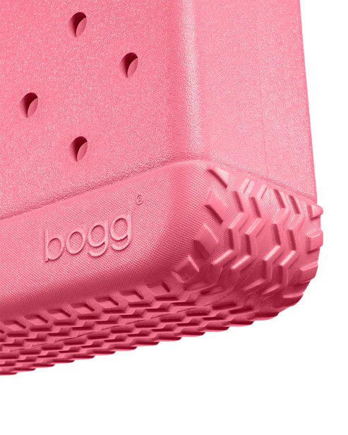 Close-up of a pink bogg bag with 'bogg' branding on a white background