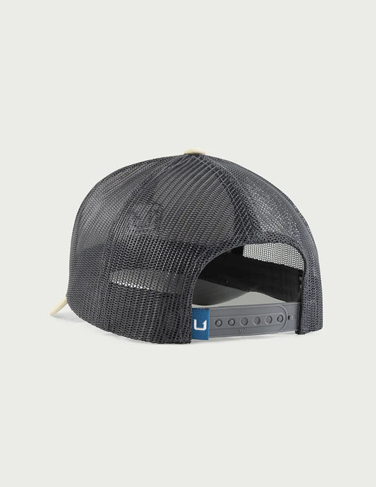 Huk Stacked U Trucker Hat in Overland