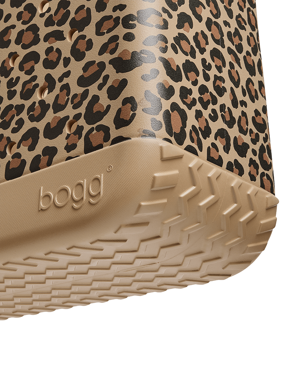 Close-up of a bogg bag with leopard print pattern and beige bottom