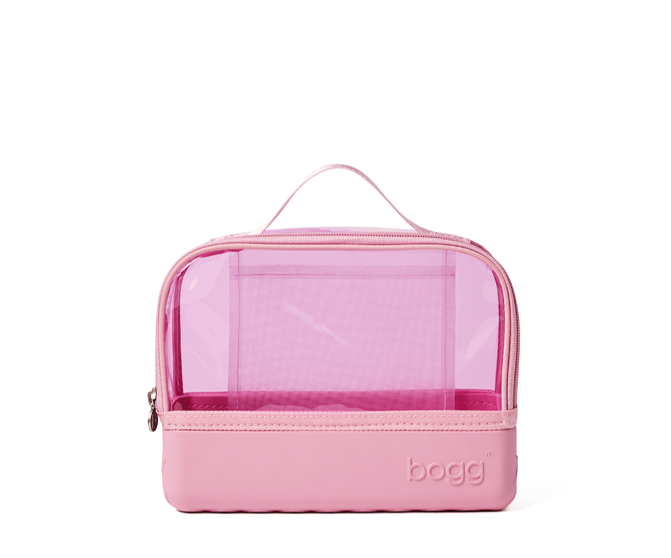 Pink cosmetic bag with transparent front section on a white background