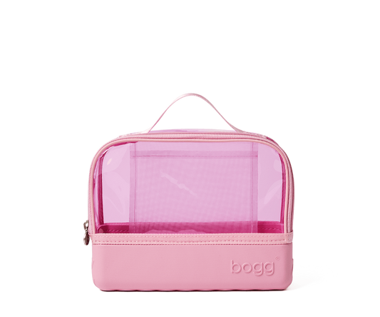 Pink cosmetic bag with transparent front section on a white background