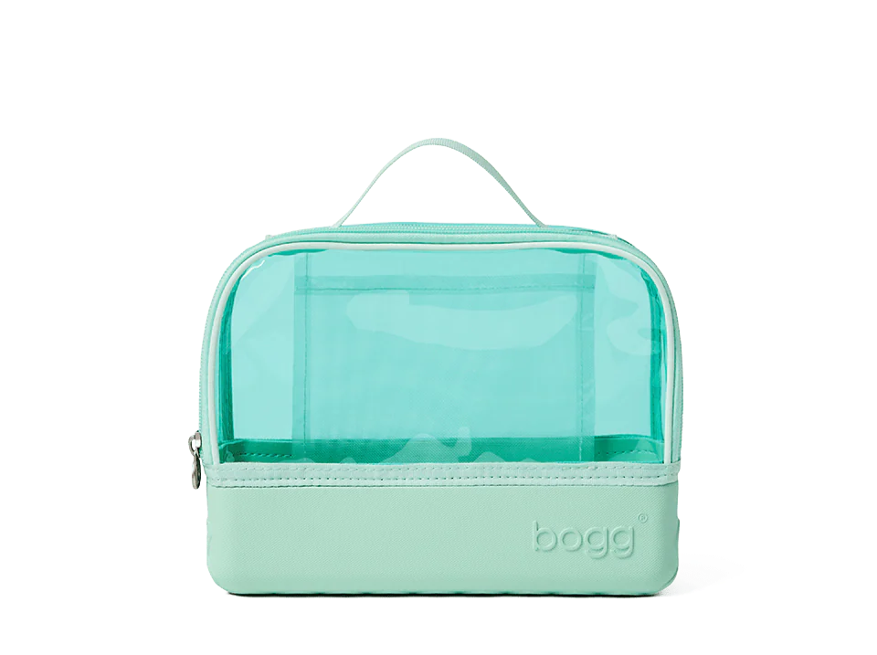 Seafoam green Bogg toiletry bag with clear top section on a white background