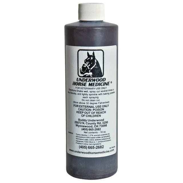 Bottle of Underwood Horse Medicine with label on a white background