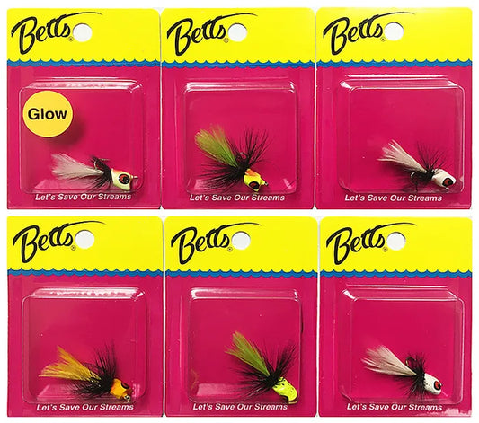 Six packages of Betts fishing lures with pink backgrounds and yellow accents.