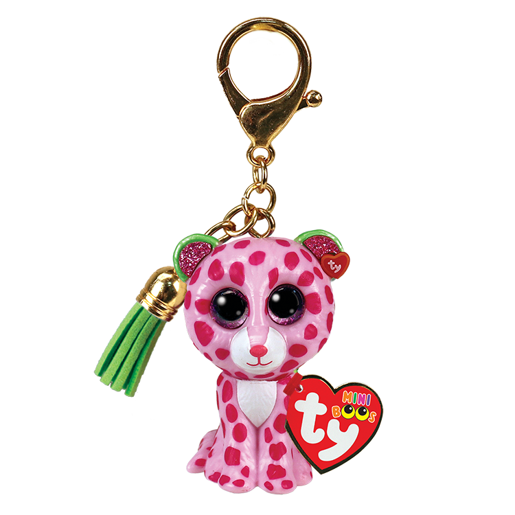 Pink polka dot leopard on gold keychain with green tassel on a clear background. Leopard has a heart-shaped Ty tag.