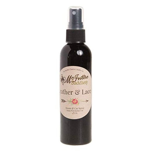 Black spray bottle labeled 'McIntire Saddlery Leather & Lace' on a white background
