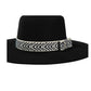 Black fedora hat with a decorative hatband on a white background