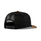 Back view of black mesh cap with brown brim on a white background