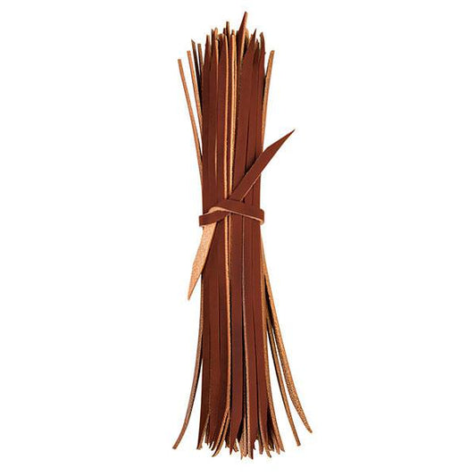 Buncle of leather strings on white background
