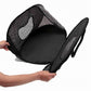 Black mesh cat carrier partially deconstructed held by a person on a white background