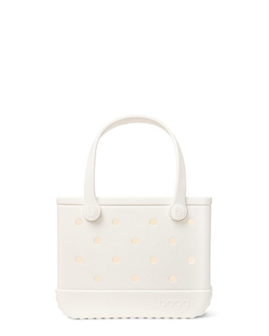 Cream shimmer Bitty Bogg bag on a white background
