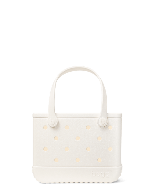 Cream shimmer Bitty Bogg bag on a white background