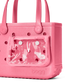Pink bogg bag with clear pouch on a white background