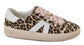 Leopard print sneaker with pink ribbon laces on a white background
