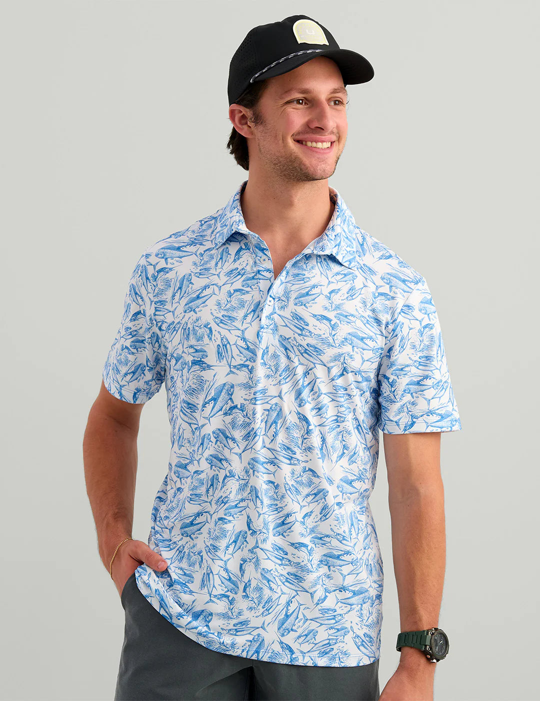 Huk KC Airweight Performance Polo in Regatta Fish Chaos