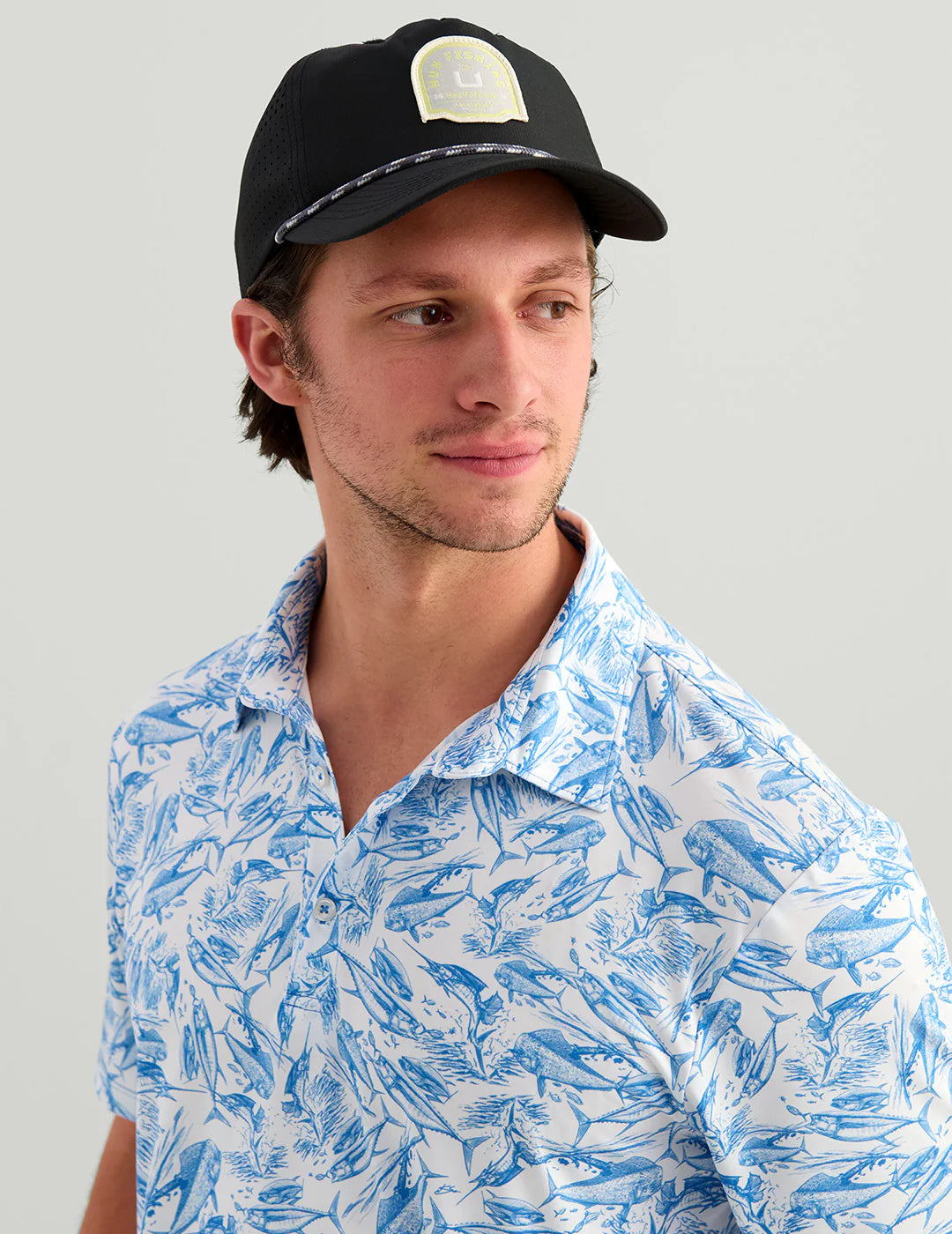 Huk KC Airweight Performance Polo in Regatta Fish Chaos