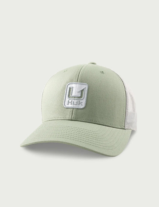 Huk Stacked U Trucker Hat in Seagrass