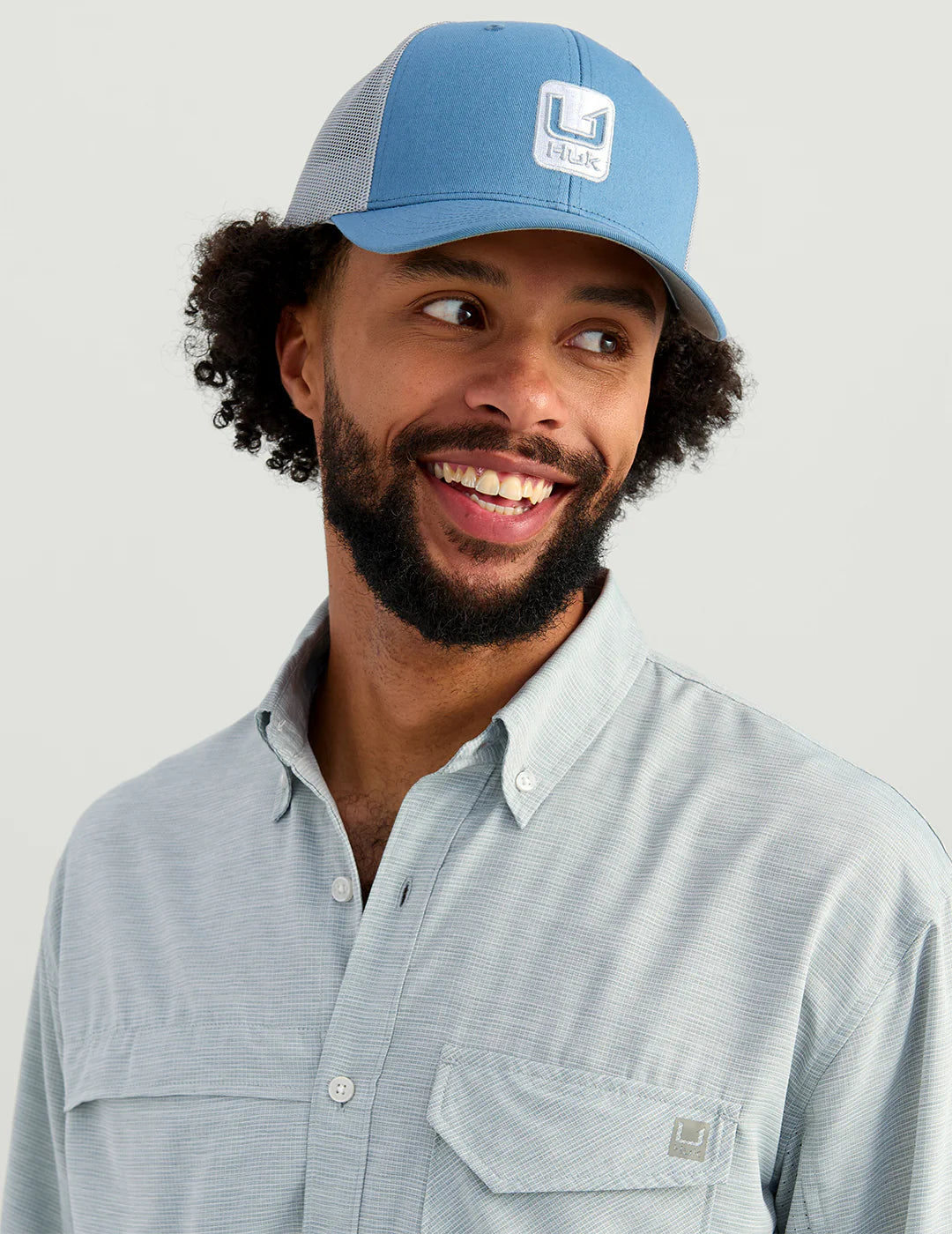 Huk Stacked U Trucker Hat in Quiet Harbor