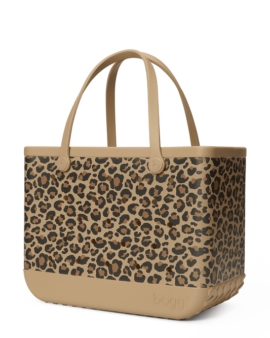 Leopard print Bogg bag with beige handle on a white background