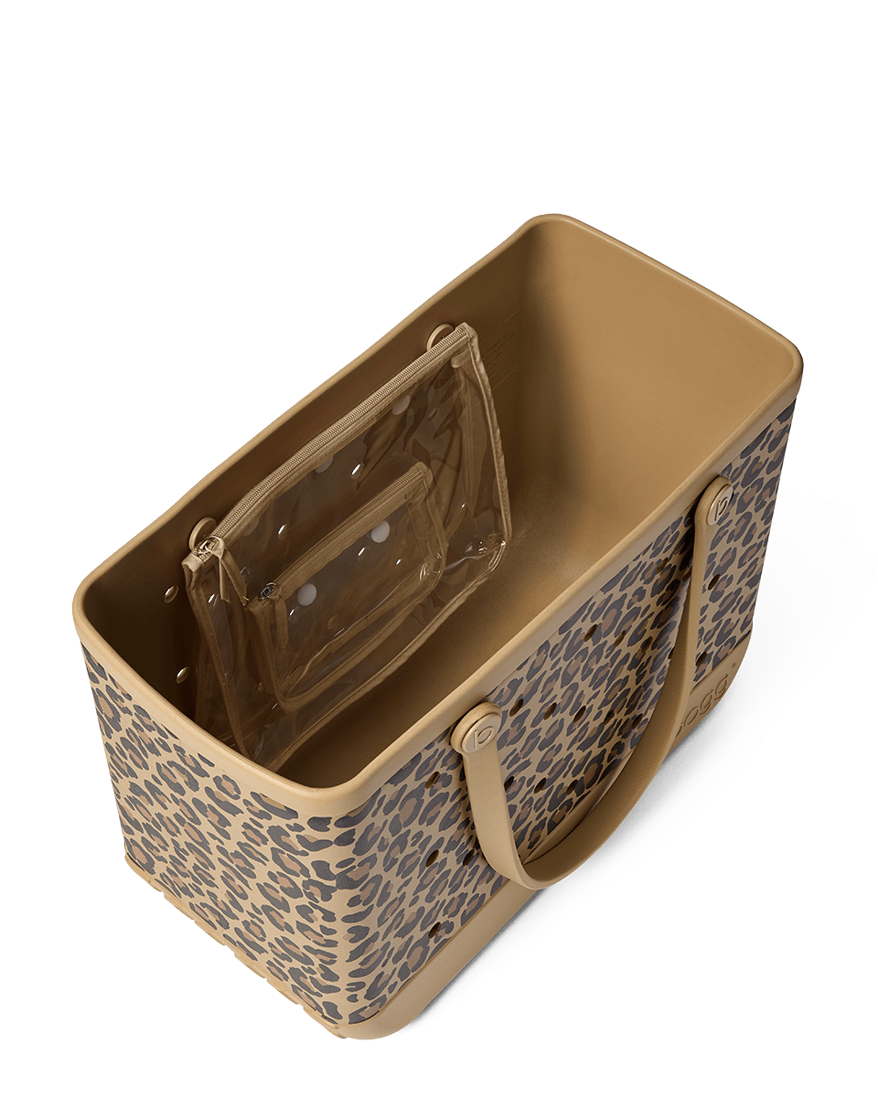 Leopard print Bogg bag with beige interior on a white background
