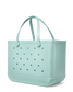 Shimmery seafoam Bogg tote bag with perforated design on a white background