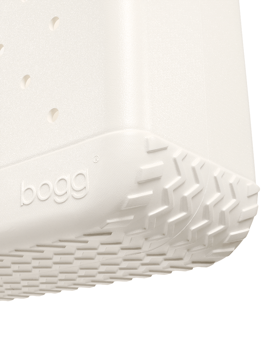 Close-up of white Bogg tote bag on a white background