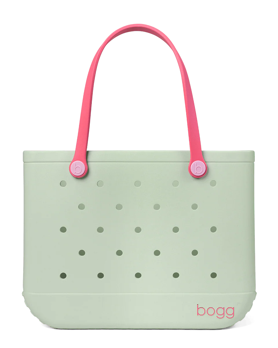 Light green tote bag with pink handles on a white background