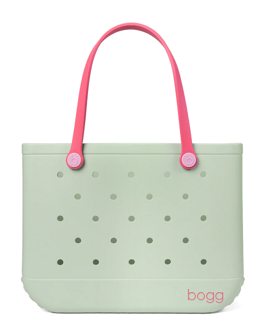 Light green tote bag with pink handles on a white background