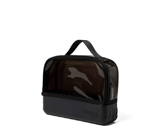 Black toiletry bag with a handle on a transparent background