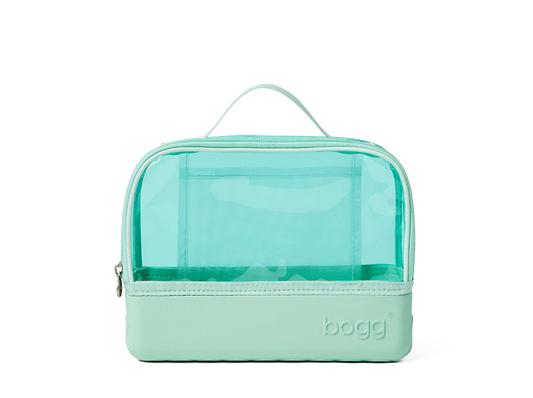 Seafoam green Bogg toiletry bag with clear top section on a white background