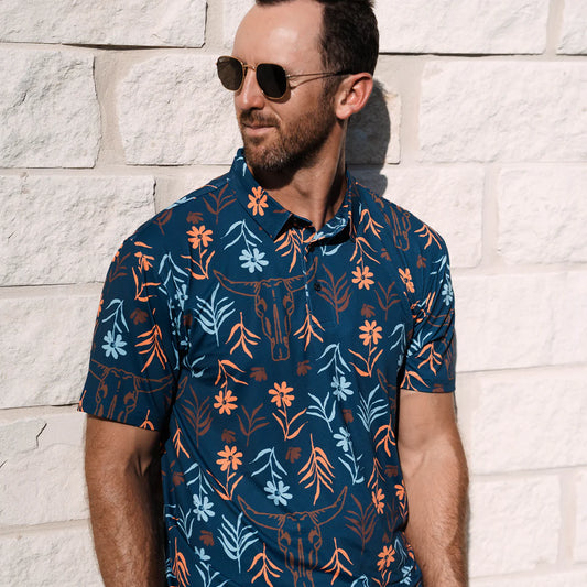 Raised by Coyotes Skulls & Daisies Polo