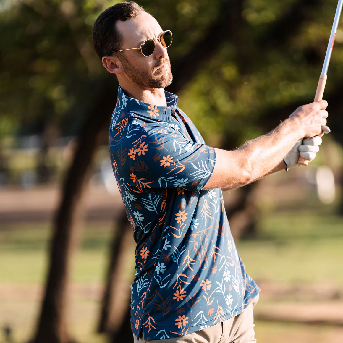 Raised by Coyotes Skulls & Daisies Polo