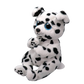 Side view of a plush dalmatian toy with black spots and blue eyes, featuring a Ty Beanie Bellies tag on a white background