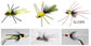 Collection of colorful fly fishing lures on a white background