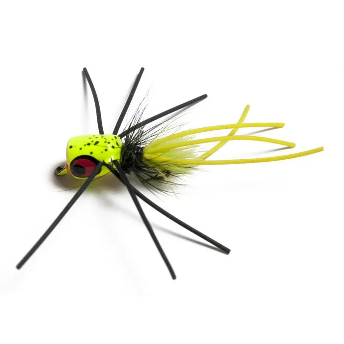 Fishing lure with yellow body and black legs on a white background