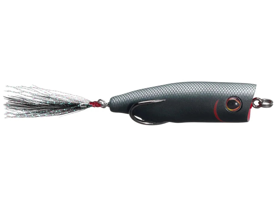 Black fishing lure with a red detailed design on a white background