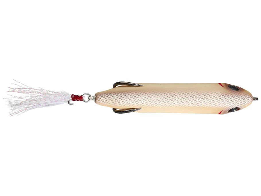 Top view of fishing lure with a white tail on a white background